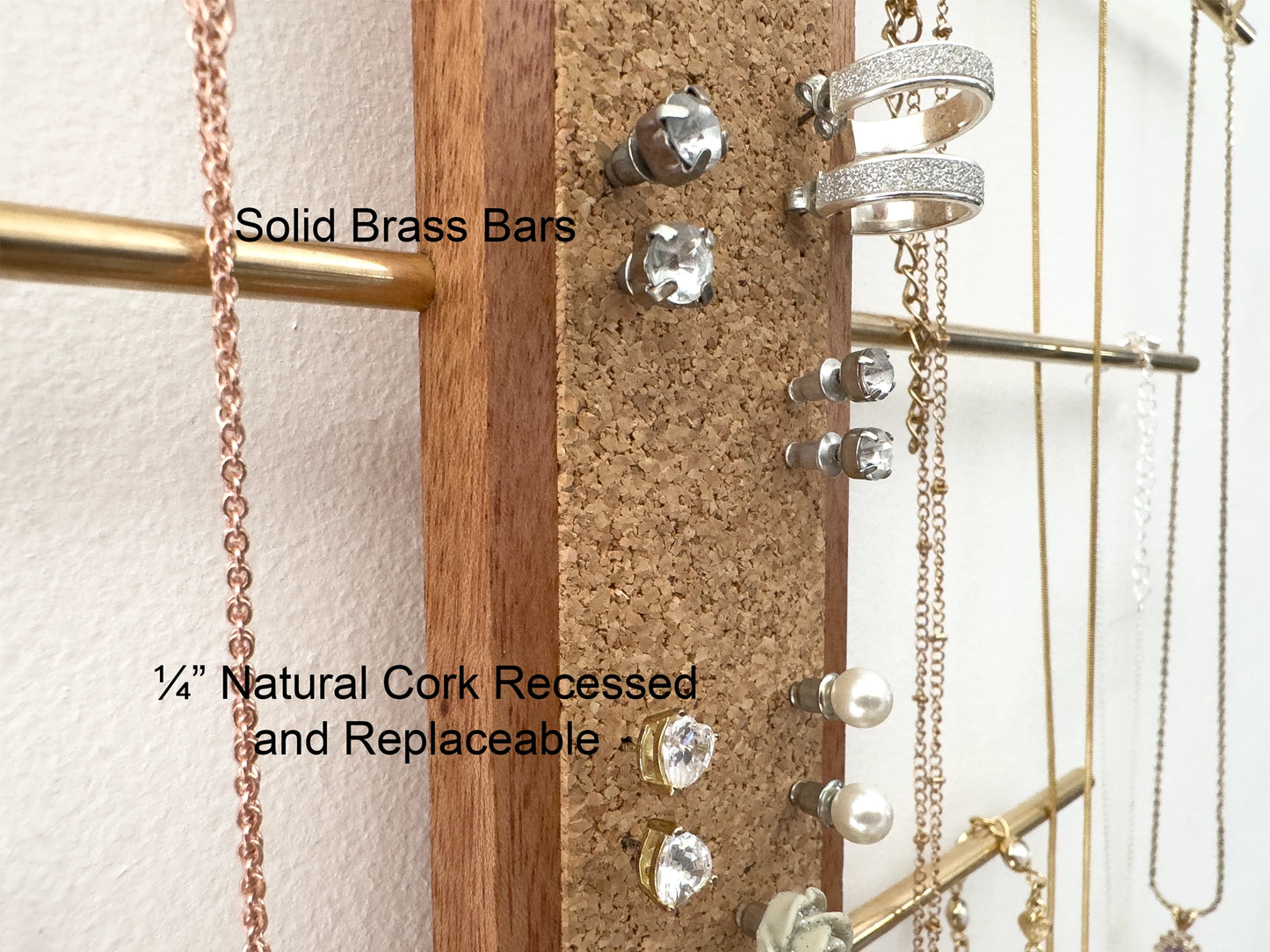 wall mounted necklace holder, close up view of natural cork for earrings