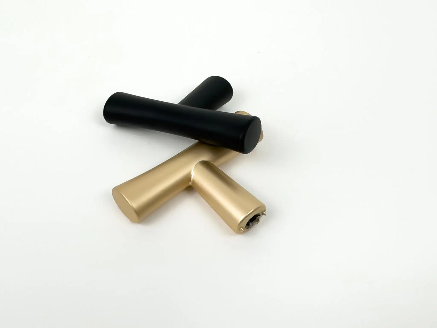 t hooks for coat racks, matte black and champagne color, close up view  