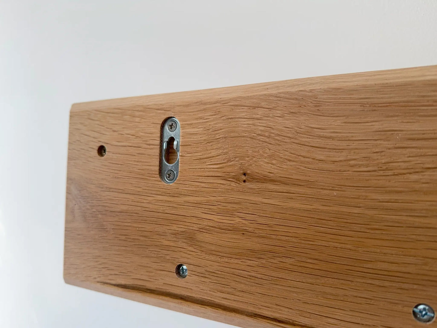 White oak coat rack with shelf, back view of hanging hardware 