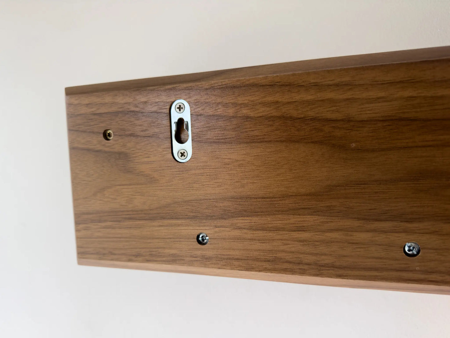 walnut coat rack with shelf, back view of hanging hardware 