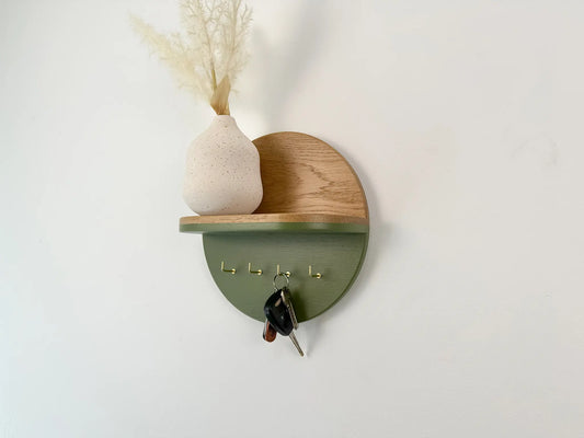 Round wall mounted key holder with shelf, white oak and green, front view